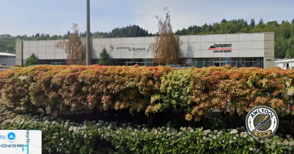 A photo of the exterior of a building with signs reading "Accomplish Interiors" and "Equipment Sales and Supplies," a type of store that would sell awl tools in Washington. 10 Best Awl Tools Shops in Washington 2025
